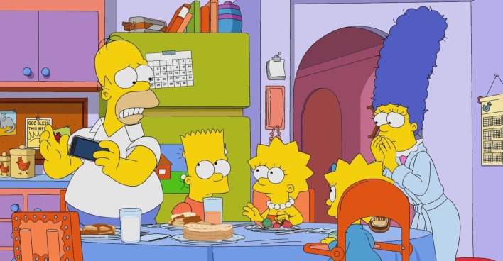 Die Simpsons-Familie nimmt ihr Frühstück in der Küche ein