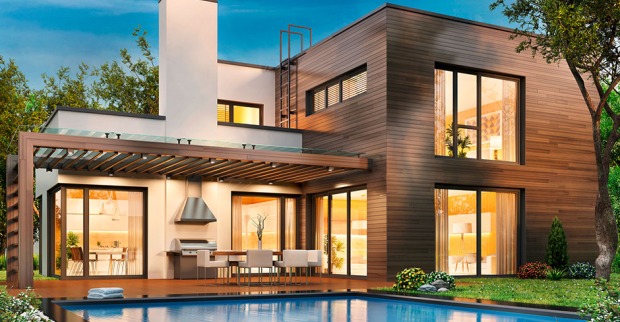 Modernes Wohnhaus mit großen Glasfronten und Pool | Credit: iStock.com/sl-f
