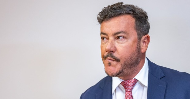 René Benko in einem Anzug