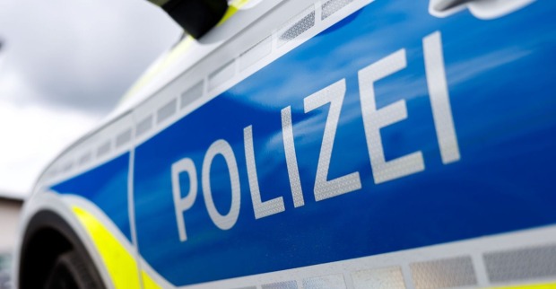 Deutscher Polizeiwagen mit Aufschrift