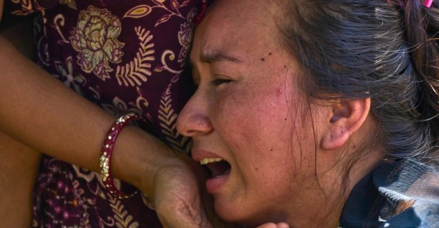 Betroffene Frau nach der verheerenden Sturzflut in Nepal.